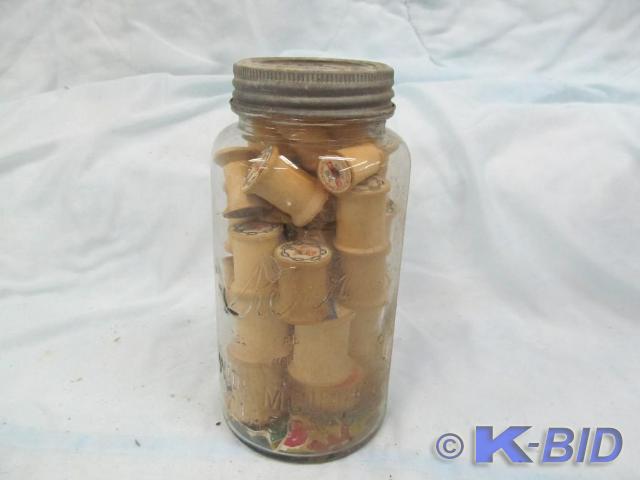 lot 56 image: Vintage Canning Jar Full of Old Woo...