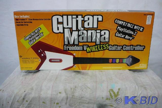 lot 7 image: Guitar Mania wireless 2.4 GHZ Guita...