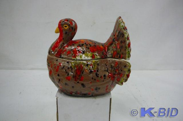 lot 11 image: Decorative turkey&nbsppot with lad...