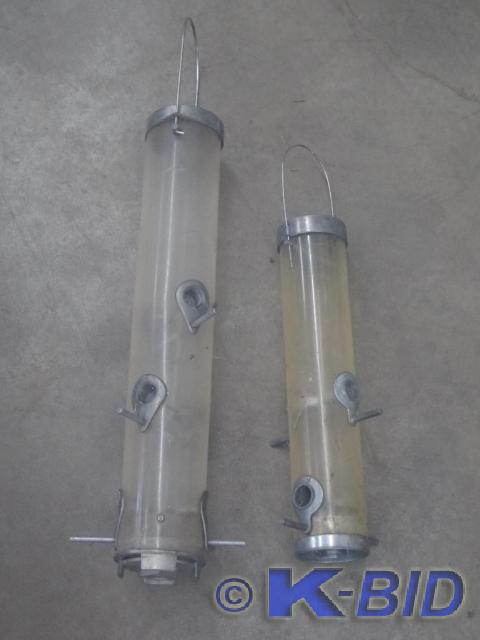 lot 34 image: (2) Cylindrical Bird Feeders