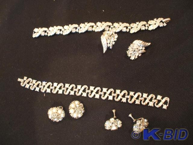 A Trifari bracelet and earring set,...
