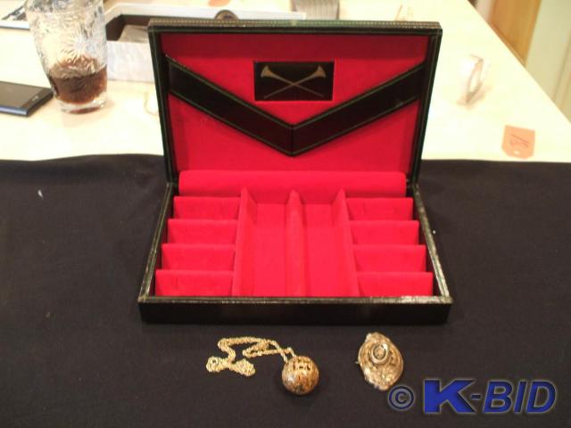 An 18K gold necklace and a goldtone...