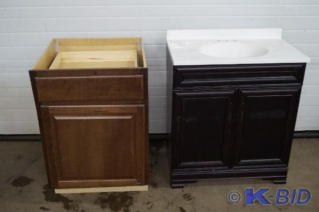 lot 15 image: Lot of 2 cabinets One 24 inch base....