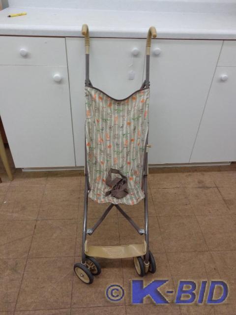 lot 105 image: Comfort Ride Baby Stroller Model 01...
