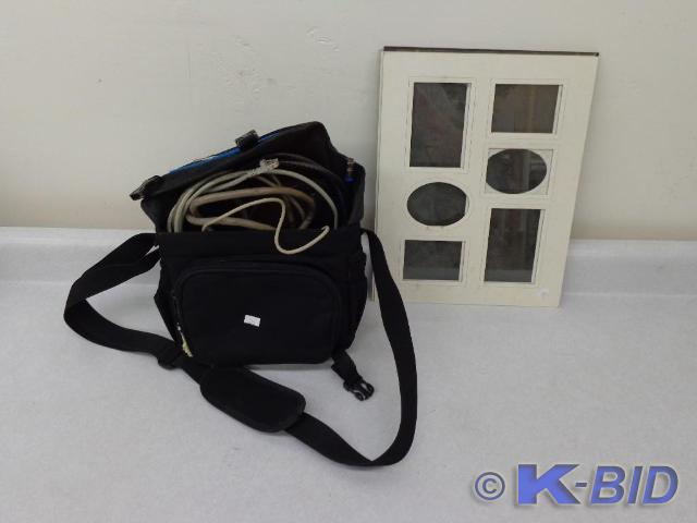 lot 21 image: Minolta Bag wAssorted Cables Ether...