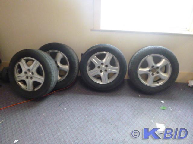 4 Aluminum Rims   5 Hole  Tires are...