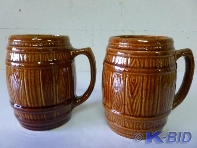 Lot of two large porcelain coated c...