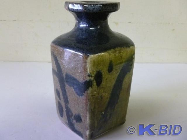 Hand Glazed Stoneware Vase that mea...