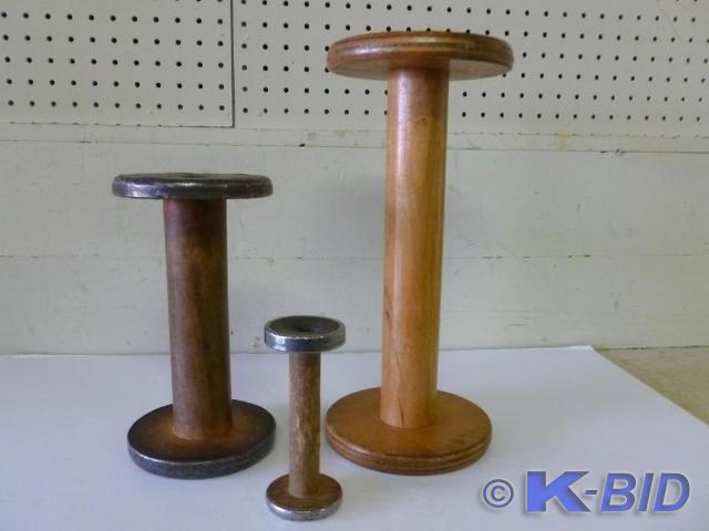Lot of three antique thread spools.