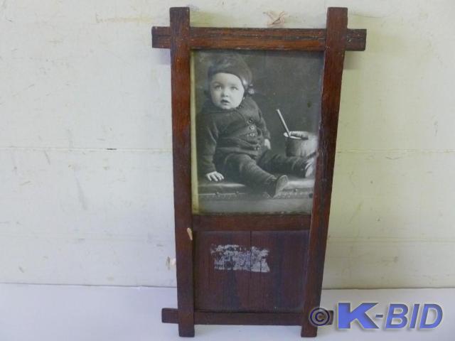 Antique wood framed black and white...