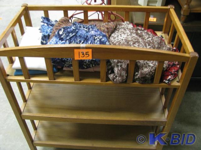 lot 135 image: lot of womans clothing and shelf