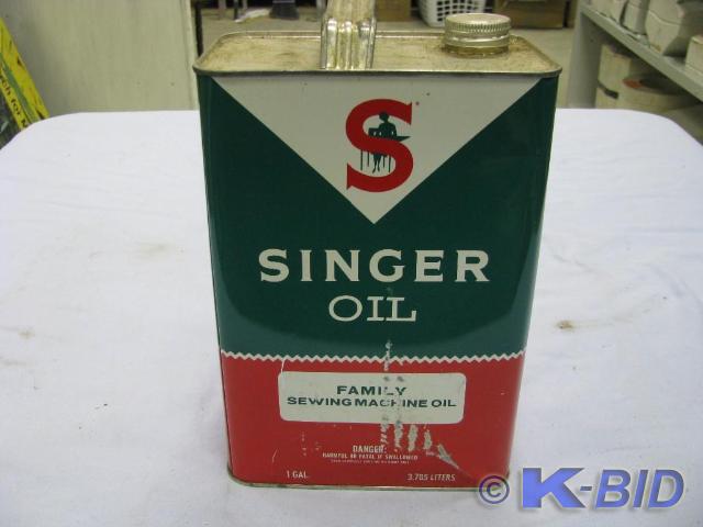 lot 59 image: one gallon of singer sewing machine...