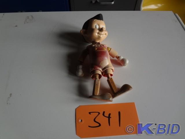 Wooden Pinocchio, that might be red...