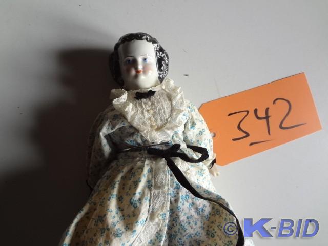 Old Porcelain doll, cloth Body