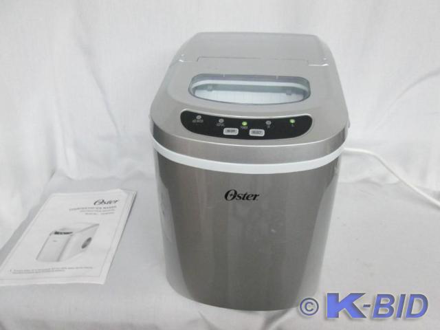 lot 20 image: Oster Portable Ice Maker  Throw the...