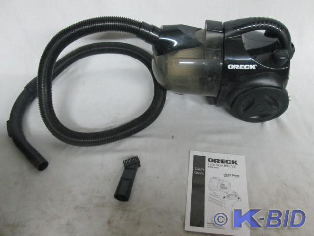 lot 23 image: Oreck XL Little Hero Canister Vacuu...