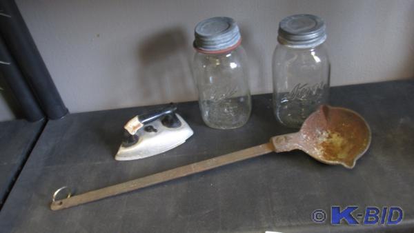Canning jars, iron ladle and tin to...
