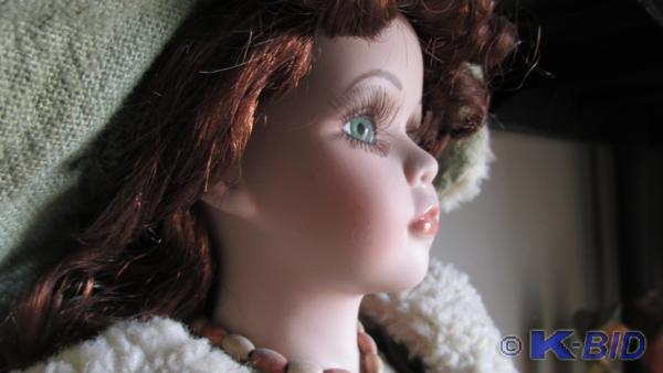 14 Beautiful porcelain doll and bl...