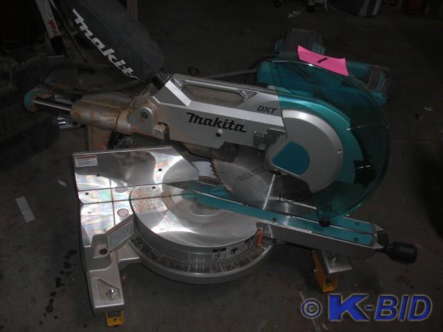 lot 1 image: Makita 12in Sliding Compound Mitre ...