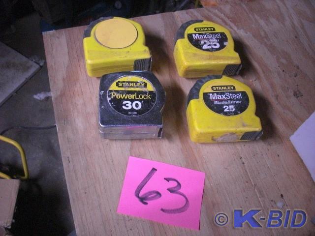 lot 63 image: 4 tape measures.. 3, 25ft 1, 30 ft