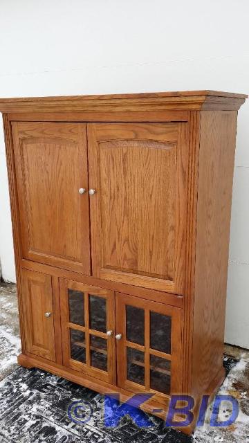 lot 1 image: Wood Entertainment Center. Stands 5...