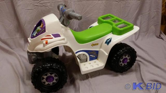 lot 25 image: Battery operated Riding Toy Story F...