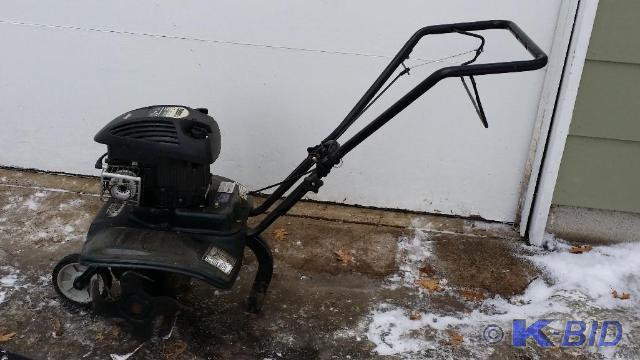 lot 82 image: Bolens 12 tines Tiller with a Brig...
