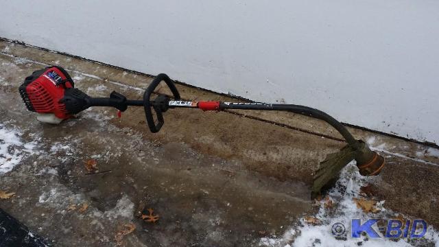 lot 89 image: Troy-bilt 4 cycle gas powered weed ...