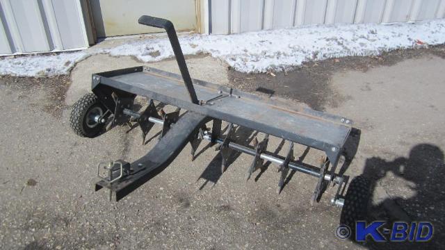 Tow behind aerator