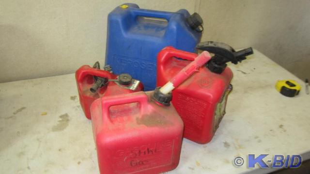 3 small gas cans, one has some gas,...
