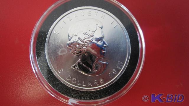 lot 128 image: 2011 1oz Silver Canadian Maple Leaf