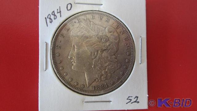 lot 52 image: 1884-O Morgan Silver Dollar