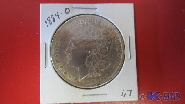 lot 67 image: 1884-O Morgan Silver Dollar