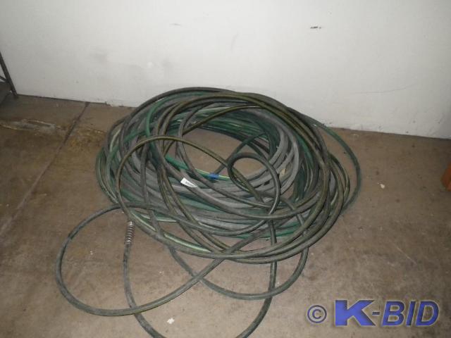 lot 60 image: pile of hoses, all good