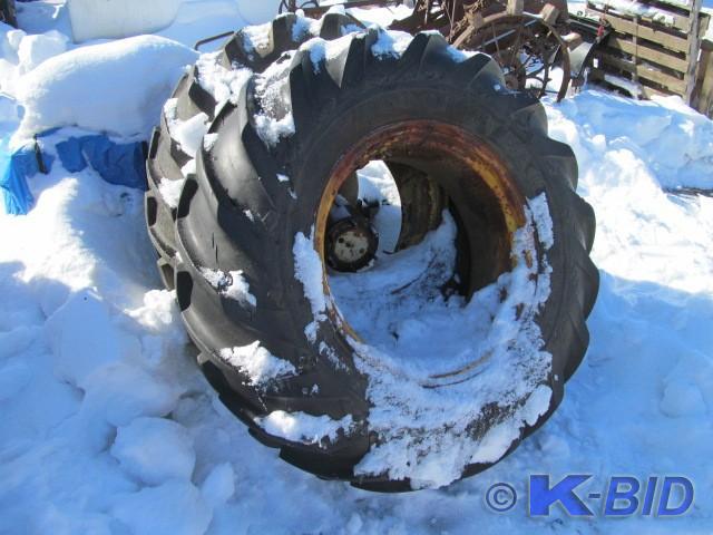lot 7 image: 2 John Deere Rims with Tires  Featu...