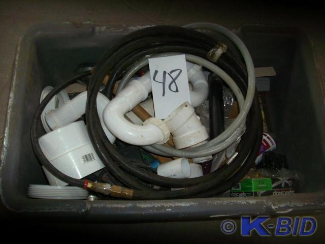 lot 48 image: Tote of misc plumbing parts and fit...