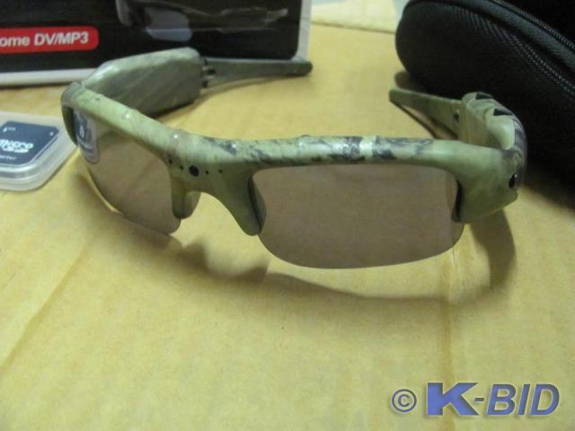 lot 32 image: Check out these cool camo sunglasse...