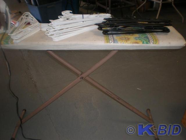 Ironing board, Iron and Hangers.