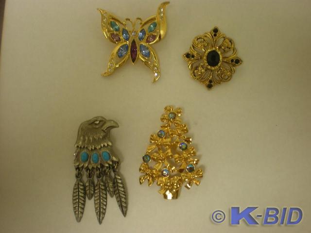 4 assorted pins.