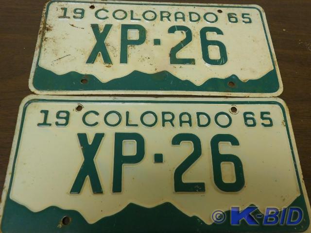 lot 24 image: 1965 VintageAntique License Plates...