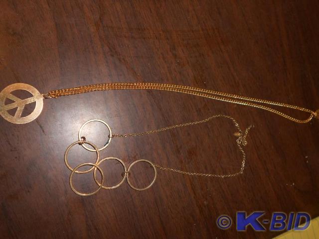 lot 63 image: Set of 2 gold Necklaces.  Metal Pea...