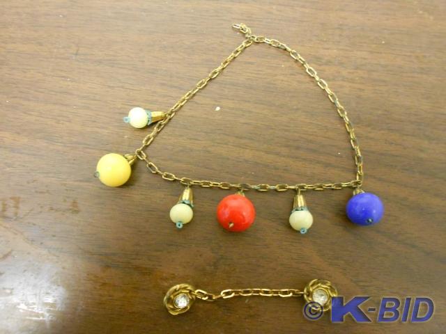 lot 64 image: Plastic beaded Necklace with gold c...