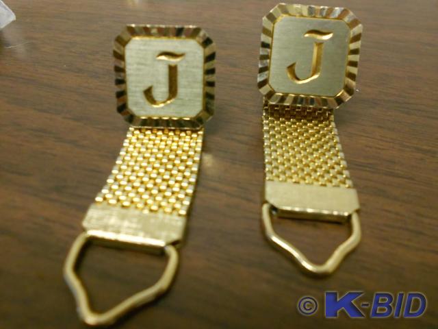 lot 85 image: Gold and Silver matching  J  cuff...
