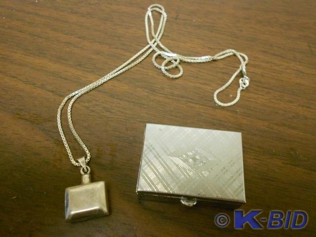lot 87 image: Square silver chained Necklace with...