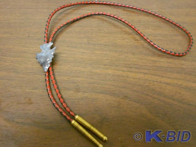 lot 96 image: Red and black tie with dark blue ar...