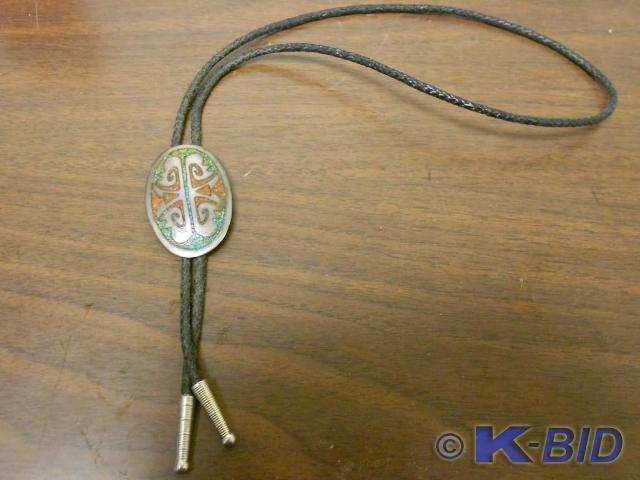 lot 99 image: All black tie with silver metal wit...