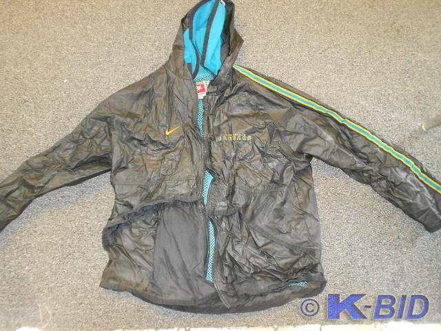 Jacksonville Jaguars Rain Coat.  Re...