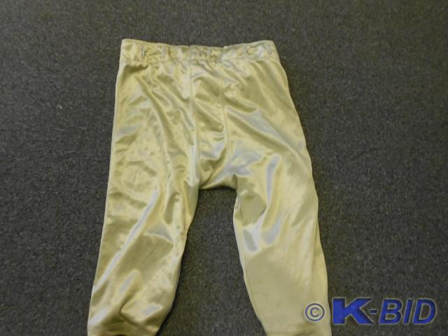 Golden pair of Football pants.  Siz...