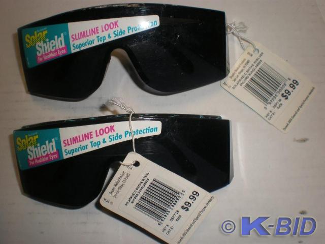 Pair of NEW Solar Shield Sunglasses...
