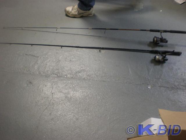 Pair of fishing poles with reels.